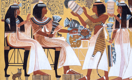 ancient Egyptians depicted on a wall with hieroglyphs.