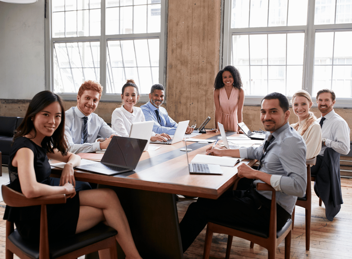 people having a meeting around a table