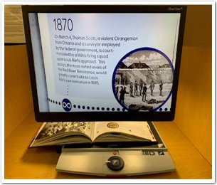 Display Print Magnifier set up at a table.